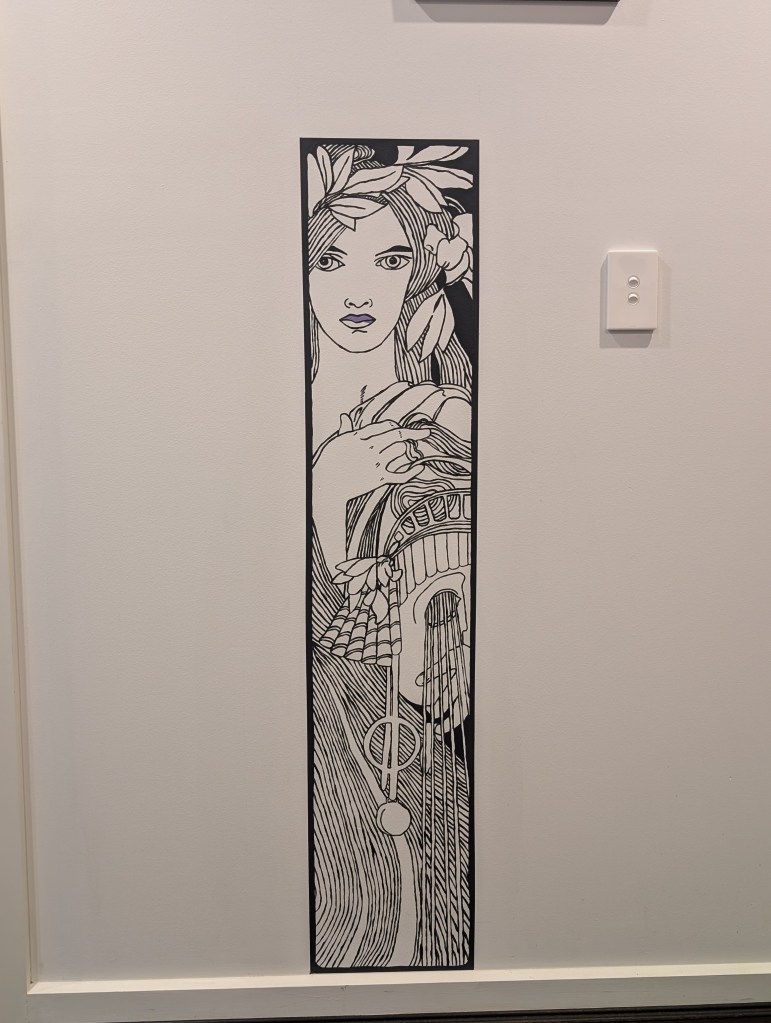 Black and white drawing in an art deco style on a wall